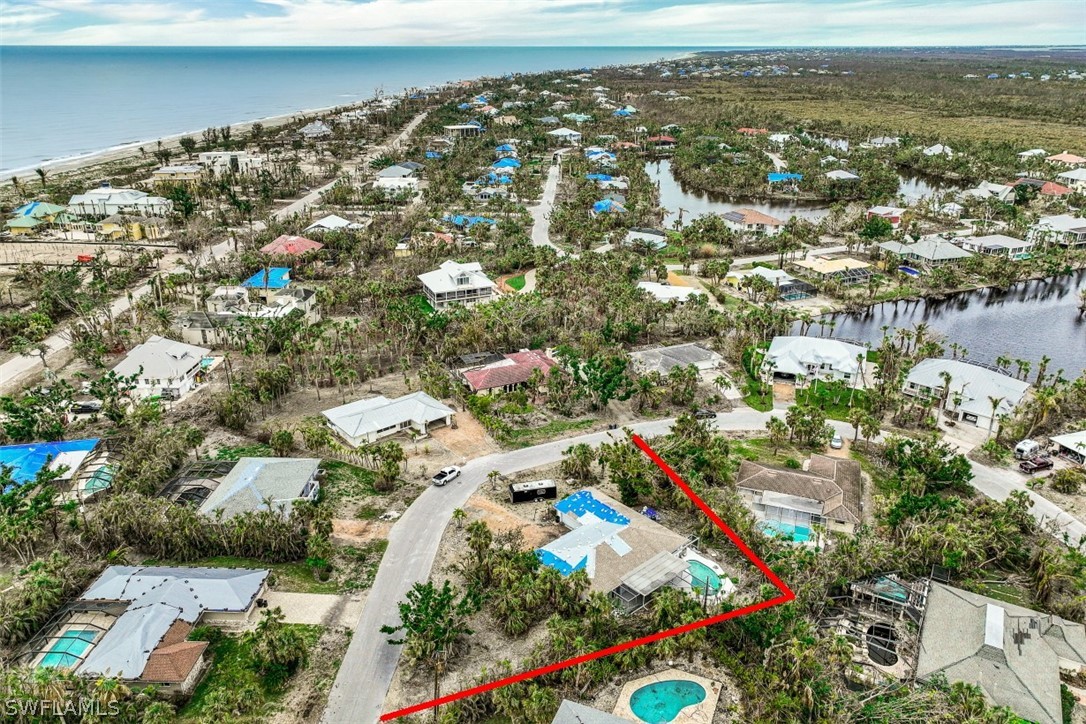 591 Boulder Drive Sanibel, FL 33957 - Photo 9 of 29 an aerial view of residential houses with outdoor space