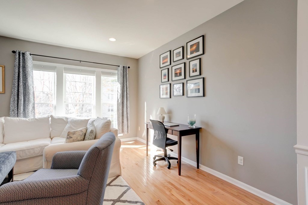 31 Jacob Way, Unit 31 Reading, MA 01867 - Photo 13 of 42 a living room with furniture and a window