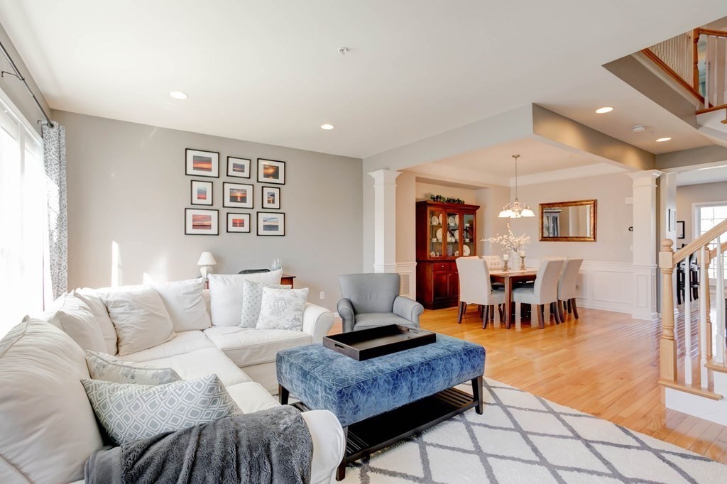 31 Jacob Way, Unit 31 Reading, MA 01867 - Photo 14 of 42 a living room with furniture and wooden floor