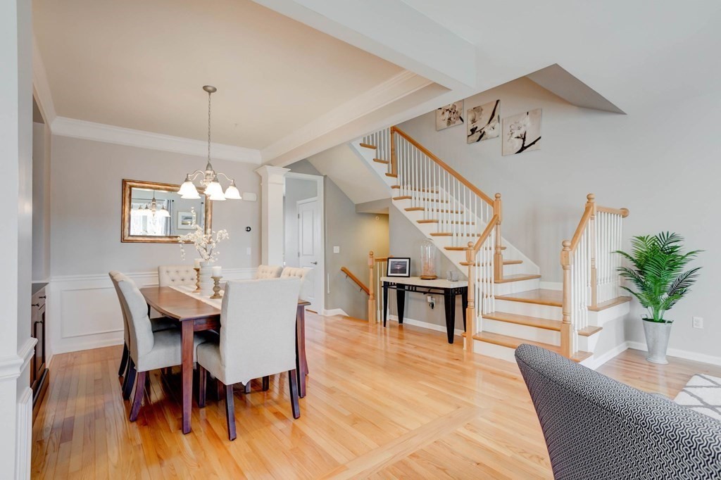 31 Jacob Way, Unit 31 Reading, MA 01867 - Photo 17 of 42 a view of a dining room with furniture