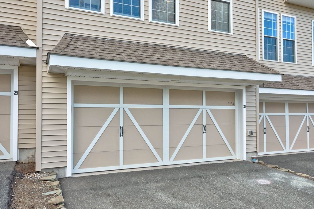 31 Jacob Way, Unit 31 Reading, MA 01867 - Photo 2 of 42 a view of front door and house