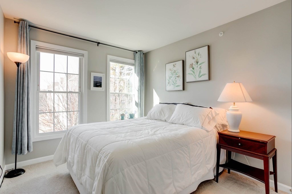 31 Jacob Way, Unit 31 Reading, MA 01867 - Photo 37 of 42 a bedroom with a bed and a window