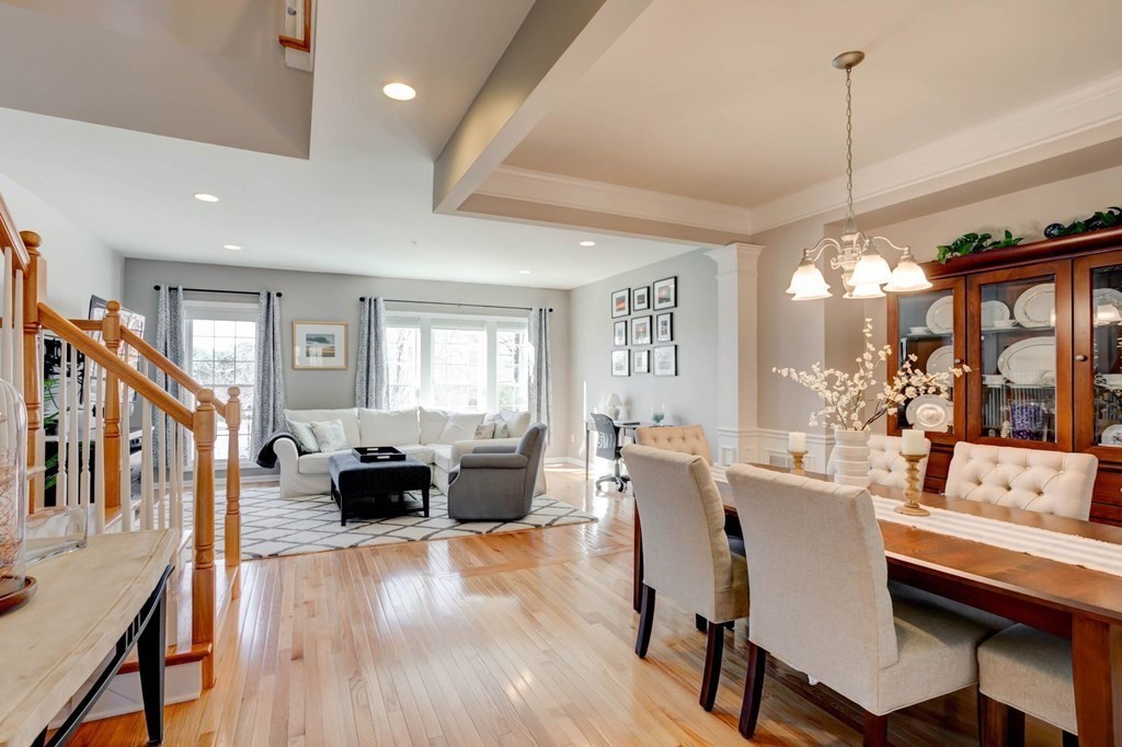 31 Jacob Way, Unit 31 Reading, MA 01867 - Photo 5 of 42 a view of a dining room with furniture window and wooden floor
