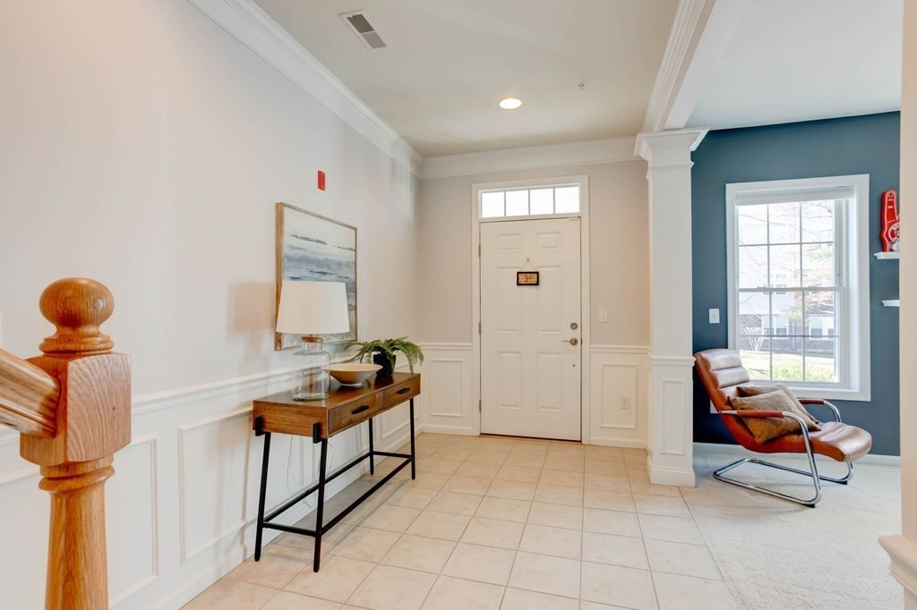 31 Jacob Way, Unit 31 Reading, MA 01867 - Photo 7 of 42 a bedroom with furniture and a window