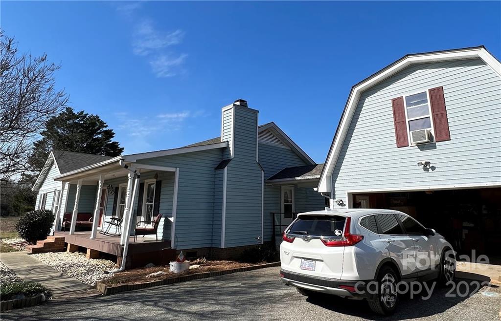 3601 Austin Road Monroe, NC 28112 - Photo 2 of 26 a white car parked in front of a house