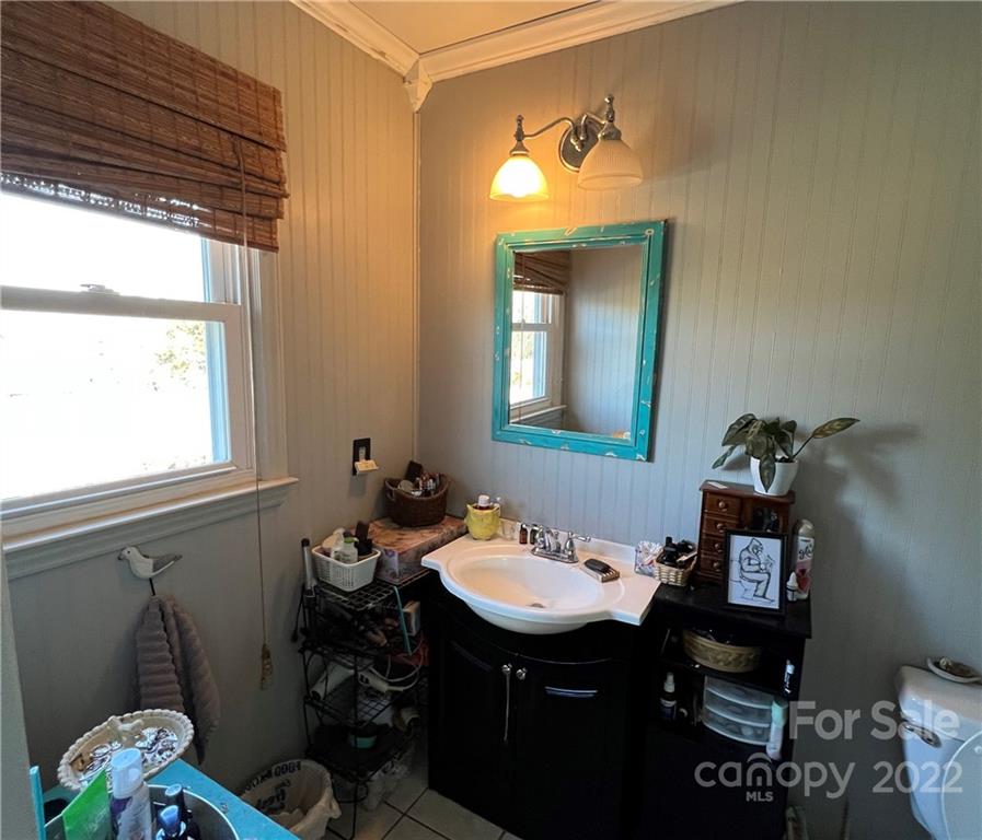 3601 Austin Road Monroe, NC 28112 - Photo 23 of 26 a bathroom with a sink mirror and a toilet