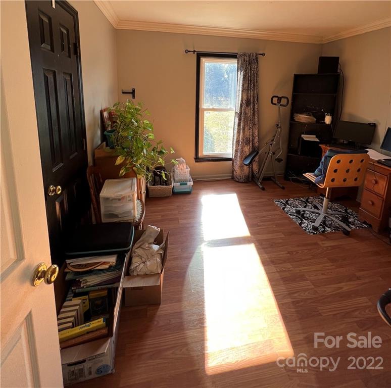 3601 Austin Road Monroe, NC 28112 - Photo 26 of 26 a living room with furniture gym equipment and a window