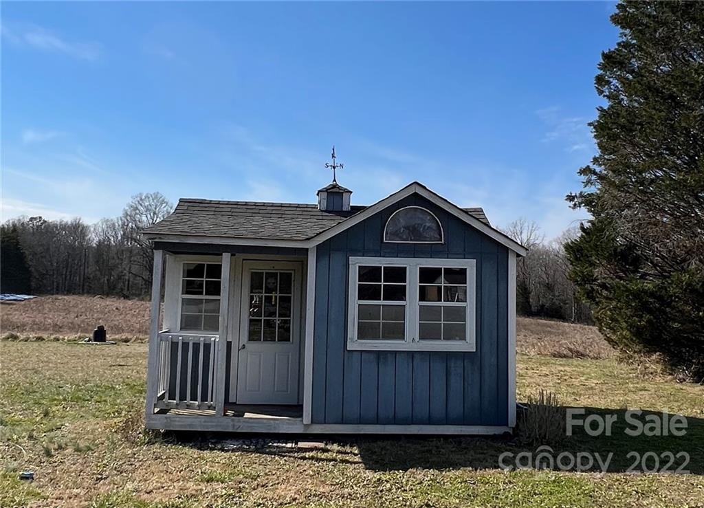 3601 Austin Road Monroe, NC 28112 - Photo 5 of 26 a front view of a house with a yard