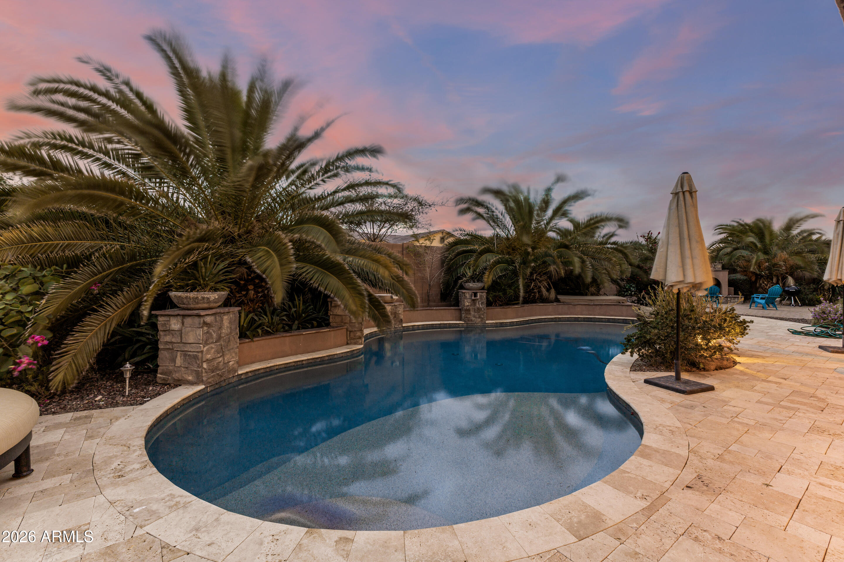 3139 East Harwell Road Phoenix, AZ 85042 - Photo 30 of 45 a view of a swimming pool with a sitting space