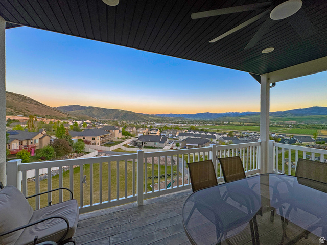 851 Grandview Drive Morgan, UT 84050 - Photo 11 of 68 Expansive covered outdoor deck featuring wood-finish flooring and white railings