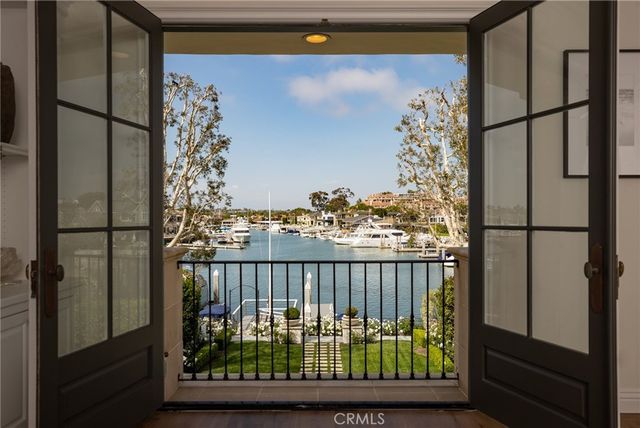 a view of a balcony with furniture and shower