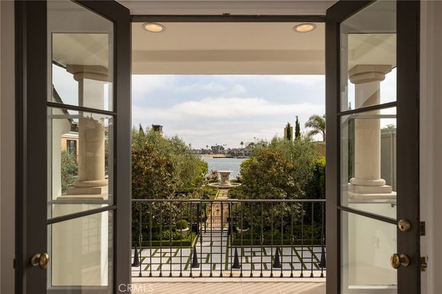 a bathroom with a double vanity sink a mirror and a shower
