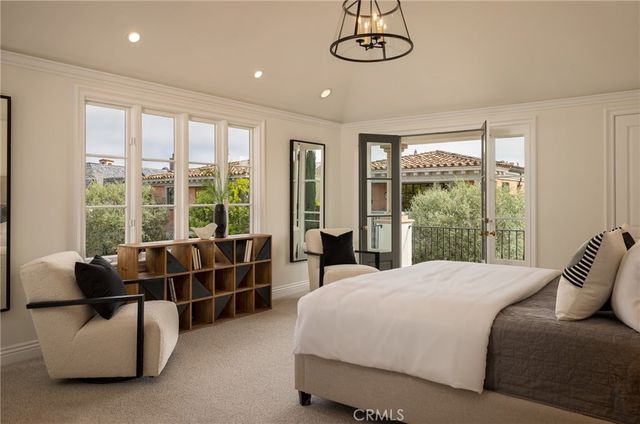 a bathroom with a double vanity sink a mirror a bathtub and shower