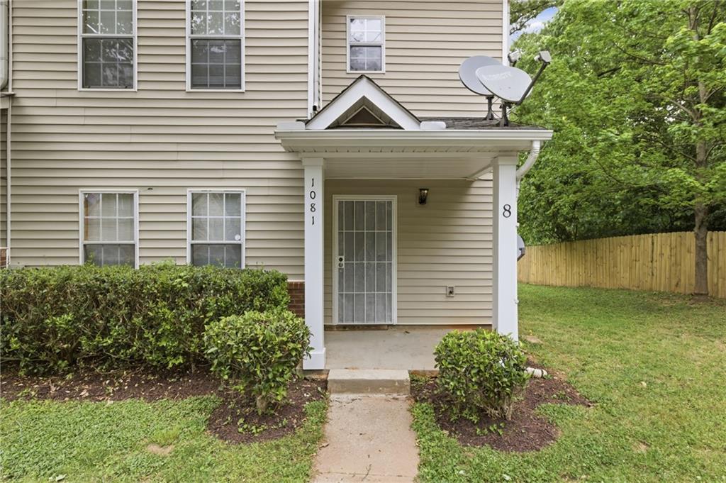 1081 Estes Drive Southwest, Unit 504 Atlanta, GA 30310 - Photo 1 of 32 a front view of a house with garden