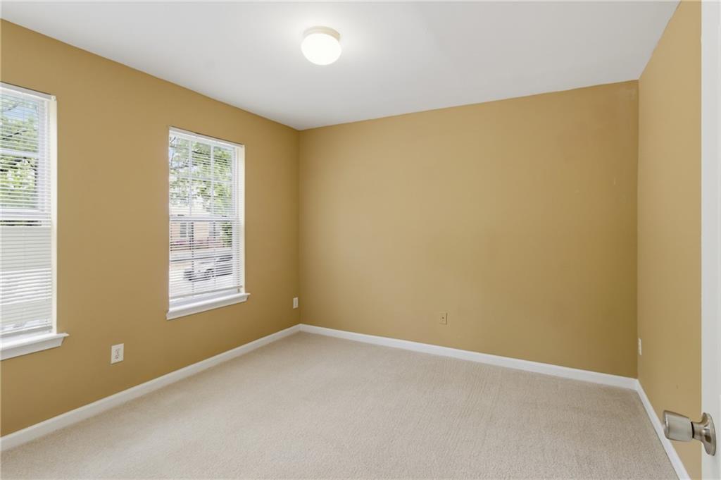 1081 Estes Drive Southwest, Unit 504 Atlanta, GA 30310 - Photo 15 of 32 a view of an empty room with a window