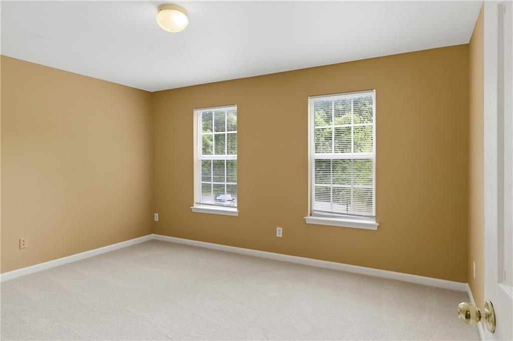 1081 Estes Drive Southwest, Unit 504 Atlanta, GA 30310 - Photo 18 of 32 an empty room with a window