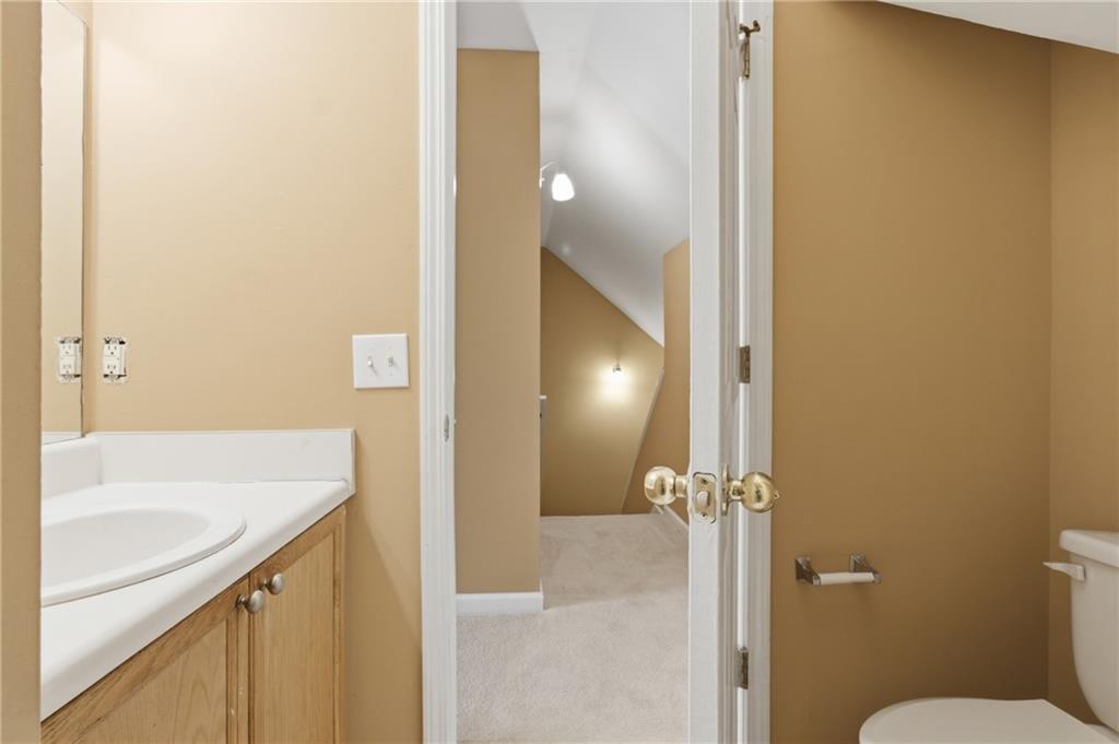 1081 Estes Drive Southwest, Unit 504 Atlanta, GA 30310 - Photo 26 of 32 a bathroom with a sink and toilet