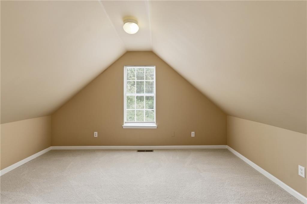 1081 Estes Drive Southwest, Unit 504 Atlanta, GA 30310 - Photo 27 of 32 an empty room with a window