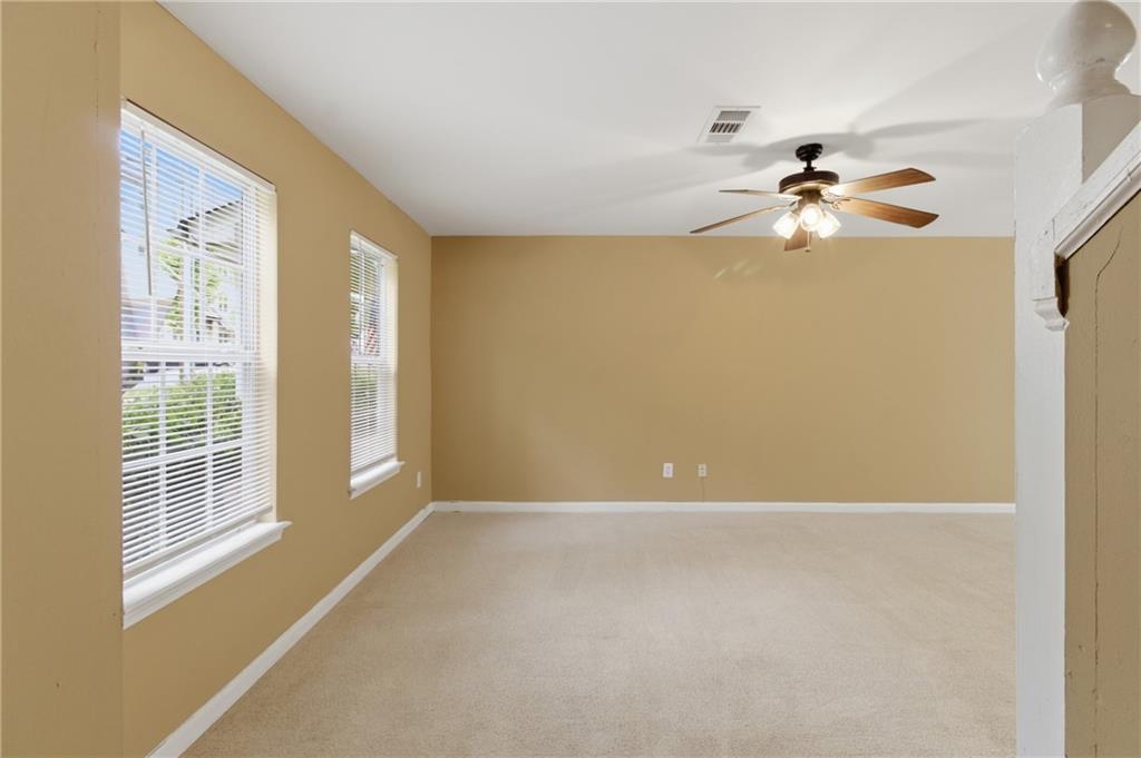 1081 Estes Drive Southwest, Unit 504 Atlanta, GA 30310 - Photo 3 of 32 a view of a big room with windows