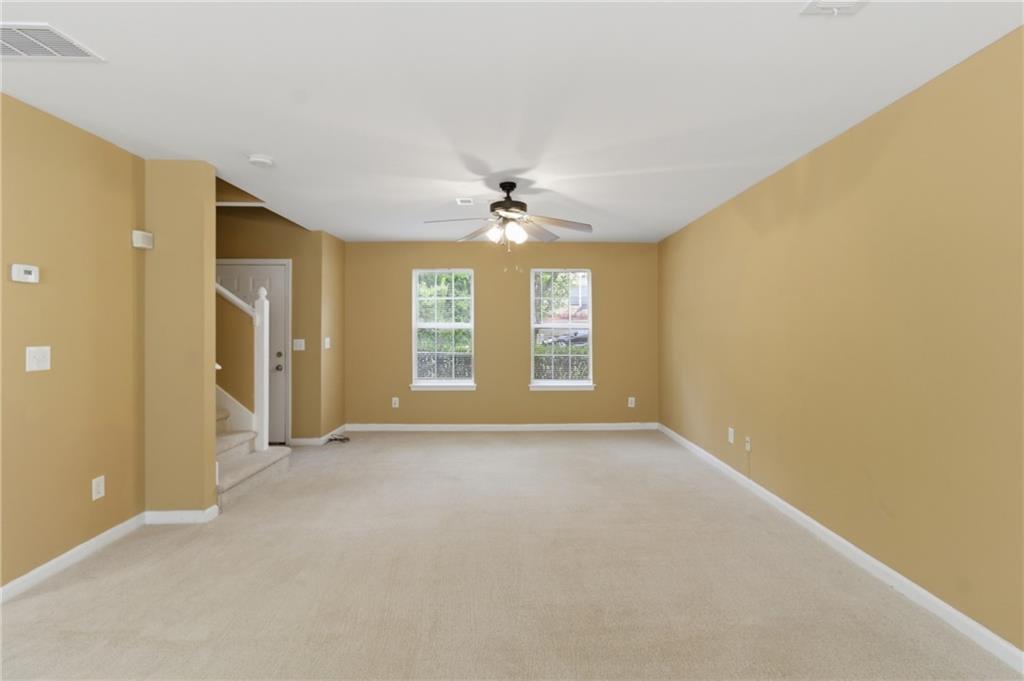 1081 Estes Drive Southwest, Unit 504 Atlanta, GA 30310 - Photo 6 of 32 a view of an empty room with a window