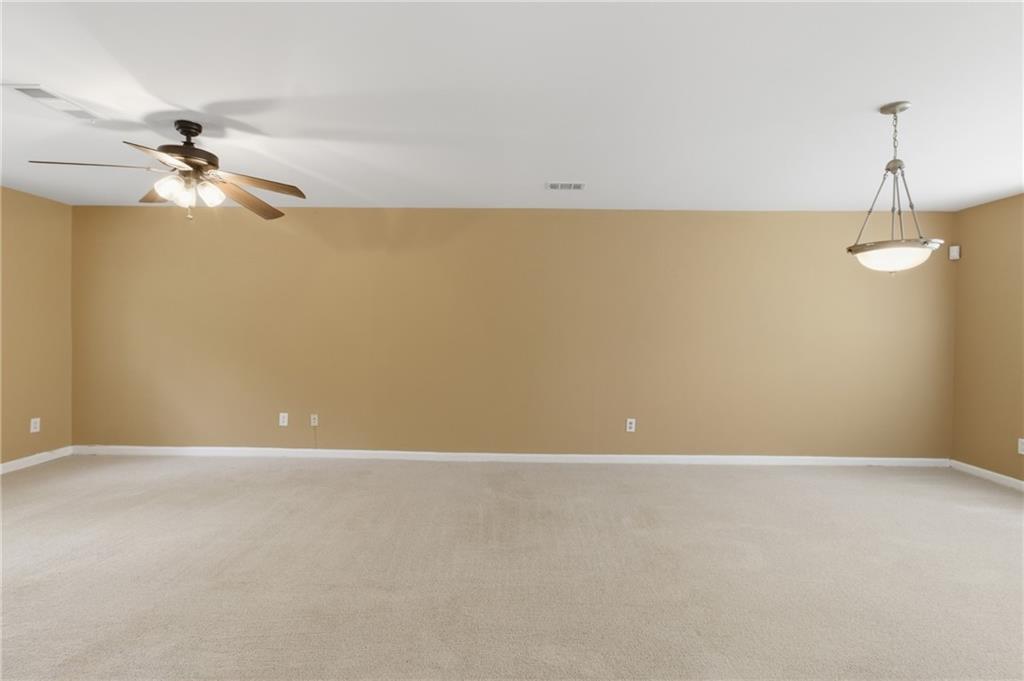 1081 Estes Drive Southwest, Unit 504 Atlanta, GA 30310 - Photo 7 of 32 a view of a big room with carpet