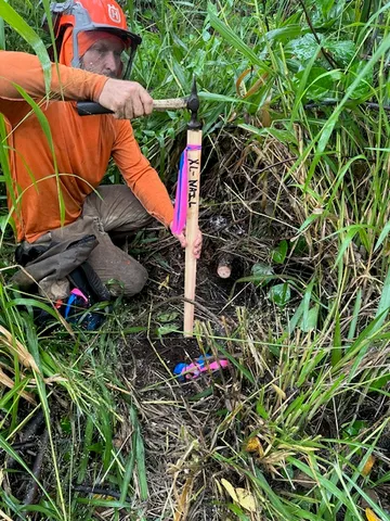 a aerial view of a house with a yard