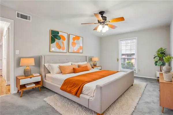a bedroom with a bed and window