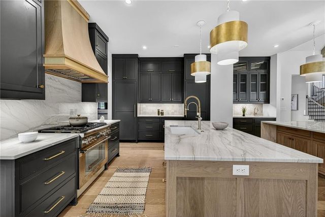 a dining room with wooden floor and outdoor view