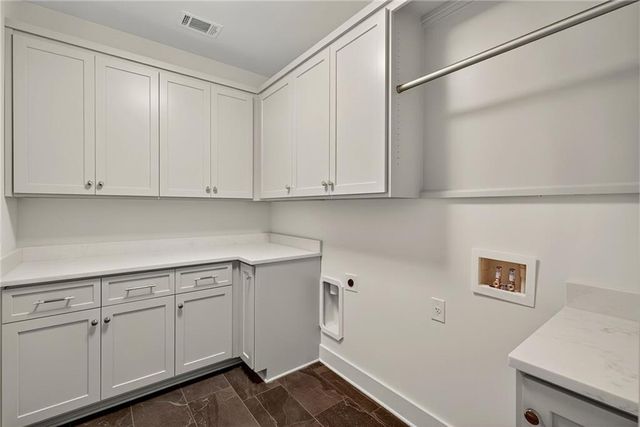 an aerial view of a house with outdoor space pool seating area and yard