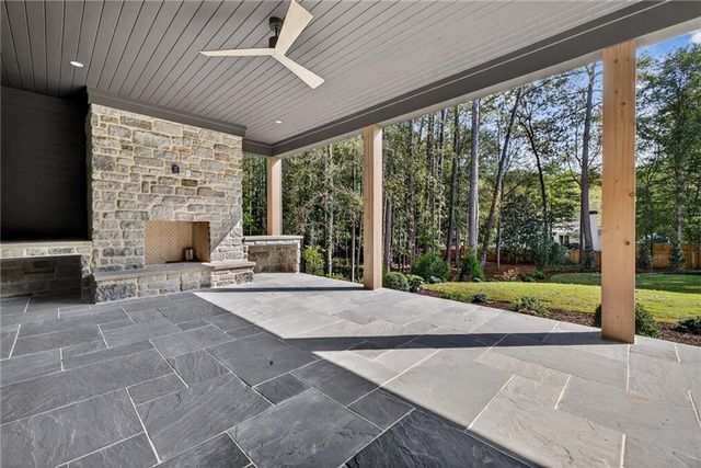 aerial view of a house with a yard