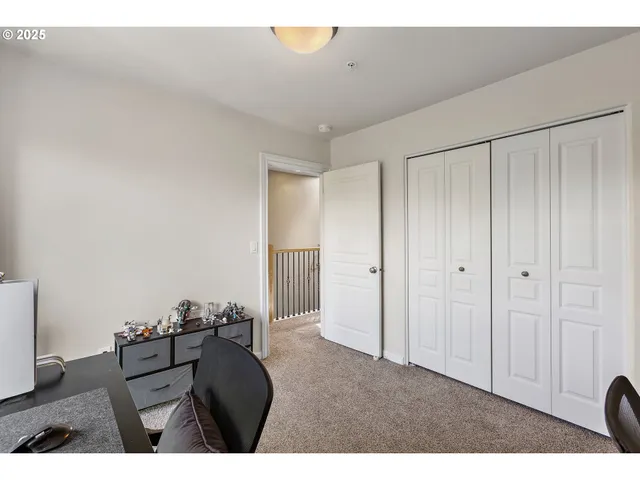 a view of a chairs and table in the patio