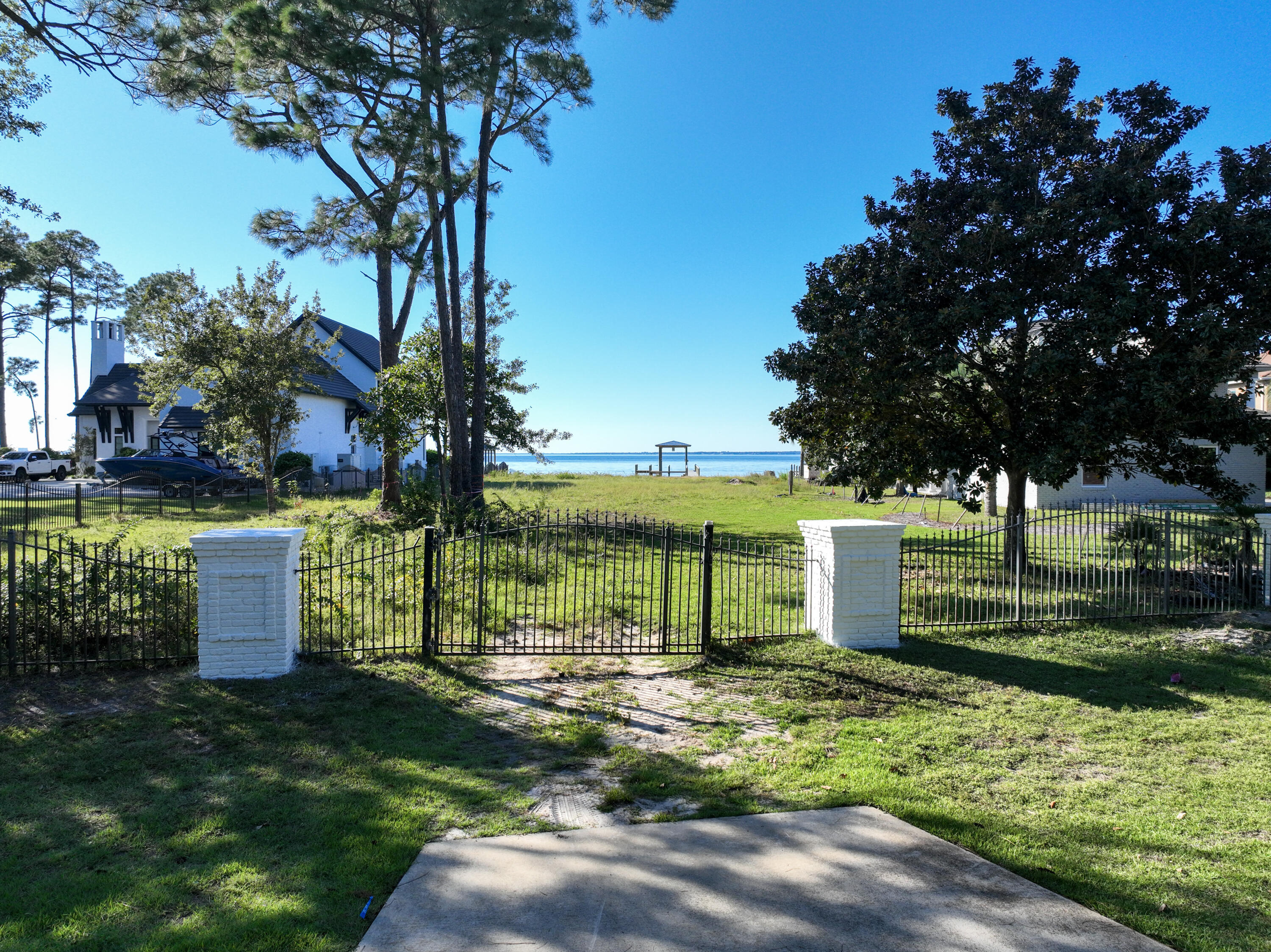643 Driftwood Point Road Santa Rosa Beach, FL 32459 - Photo 12 of 17 a view of a house with a yard