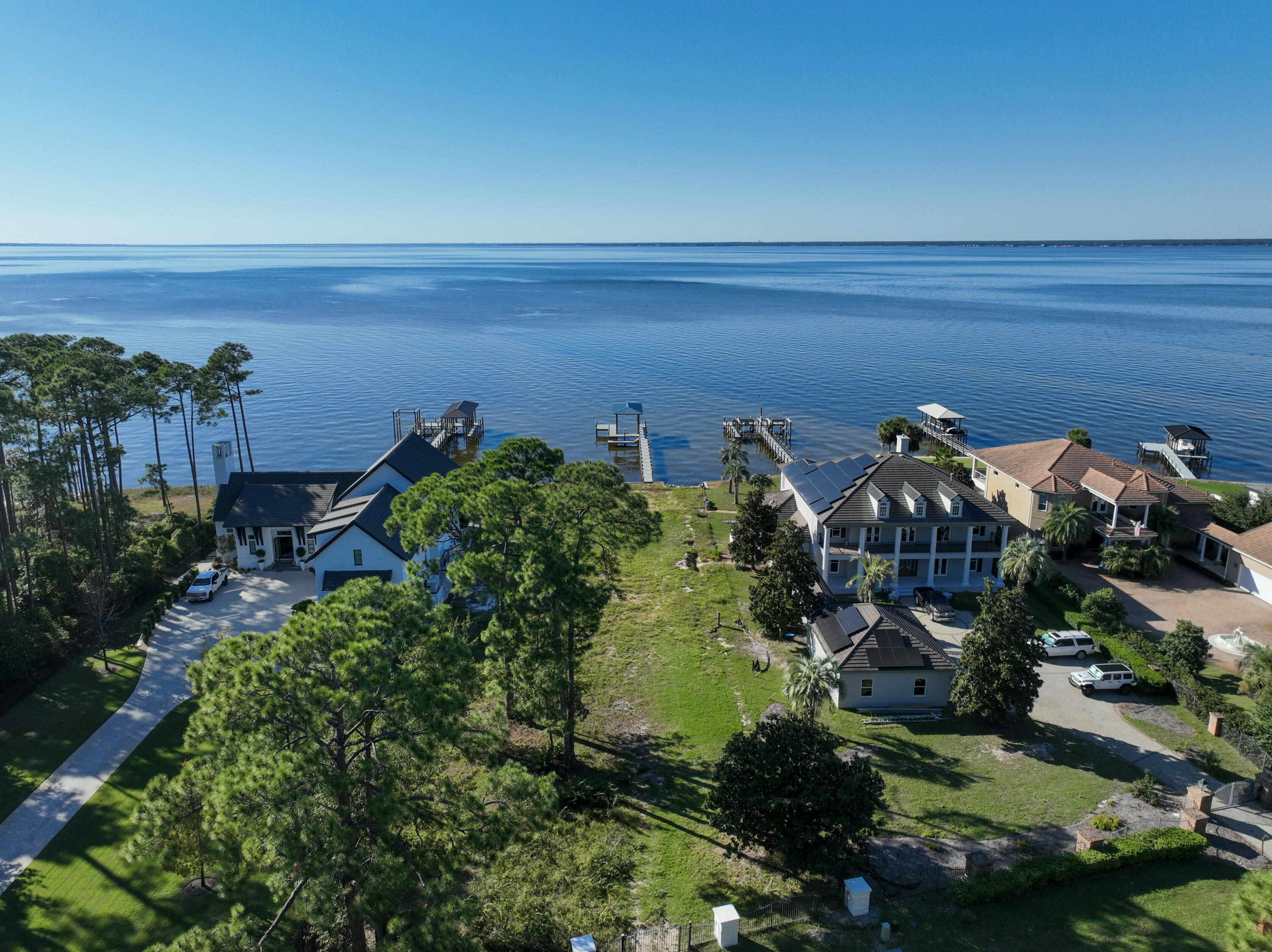 643 Driftwood Point Road Santa Rosa Beach, FL 32459 - Photo 16 of 17 an aerial view of a house with a yard