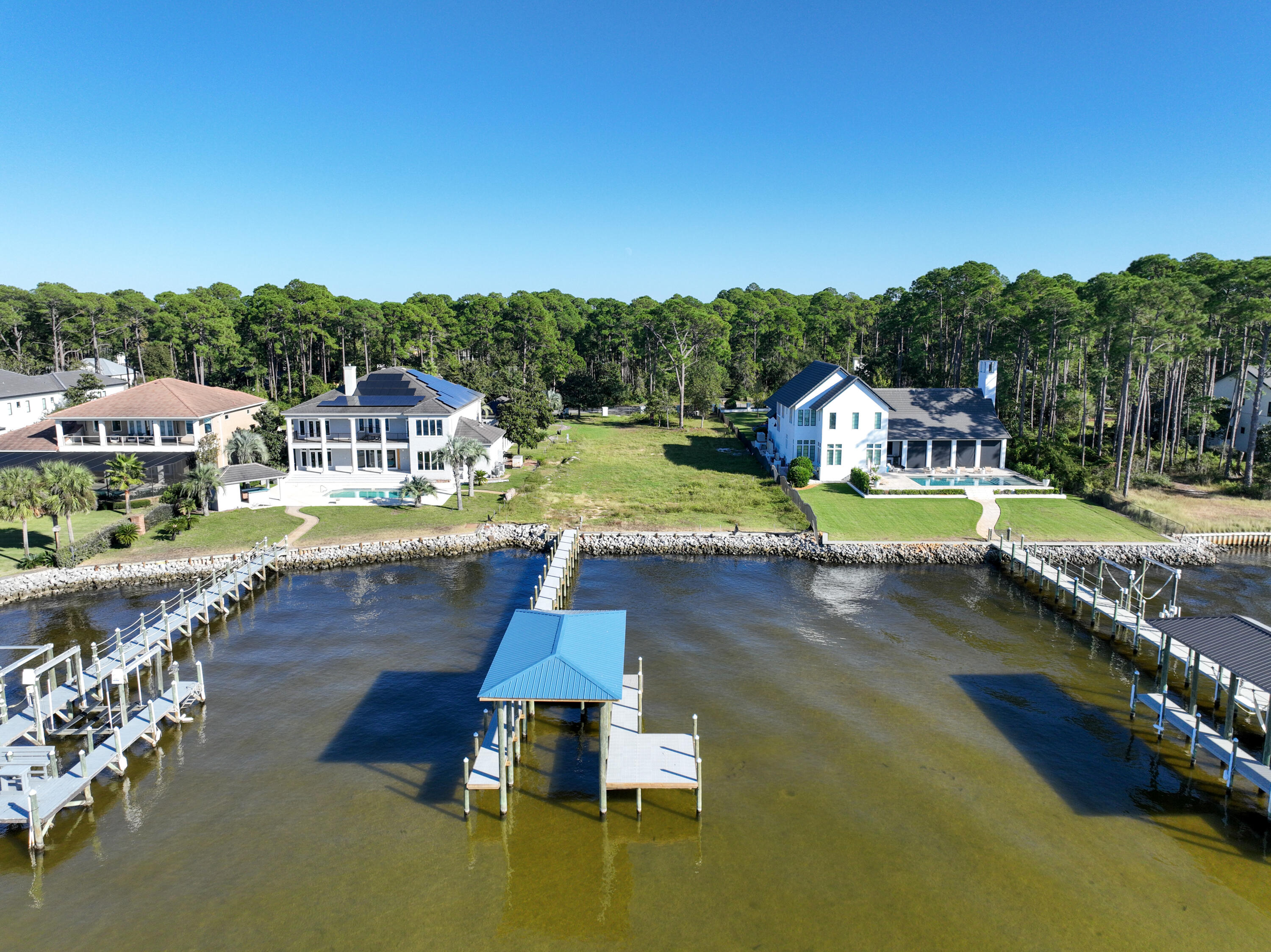 643 Driftwood Point Road Santa Rosa Beach, FL 32459 - Photo 2 of 17 a view of an ocean with city houses and lake view