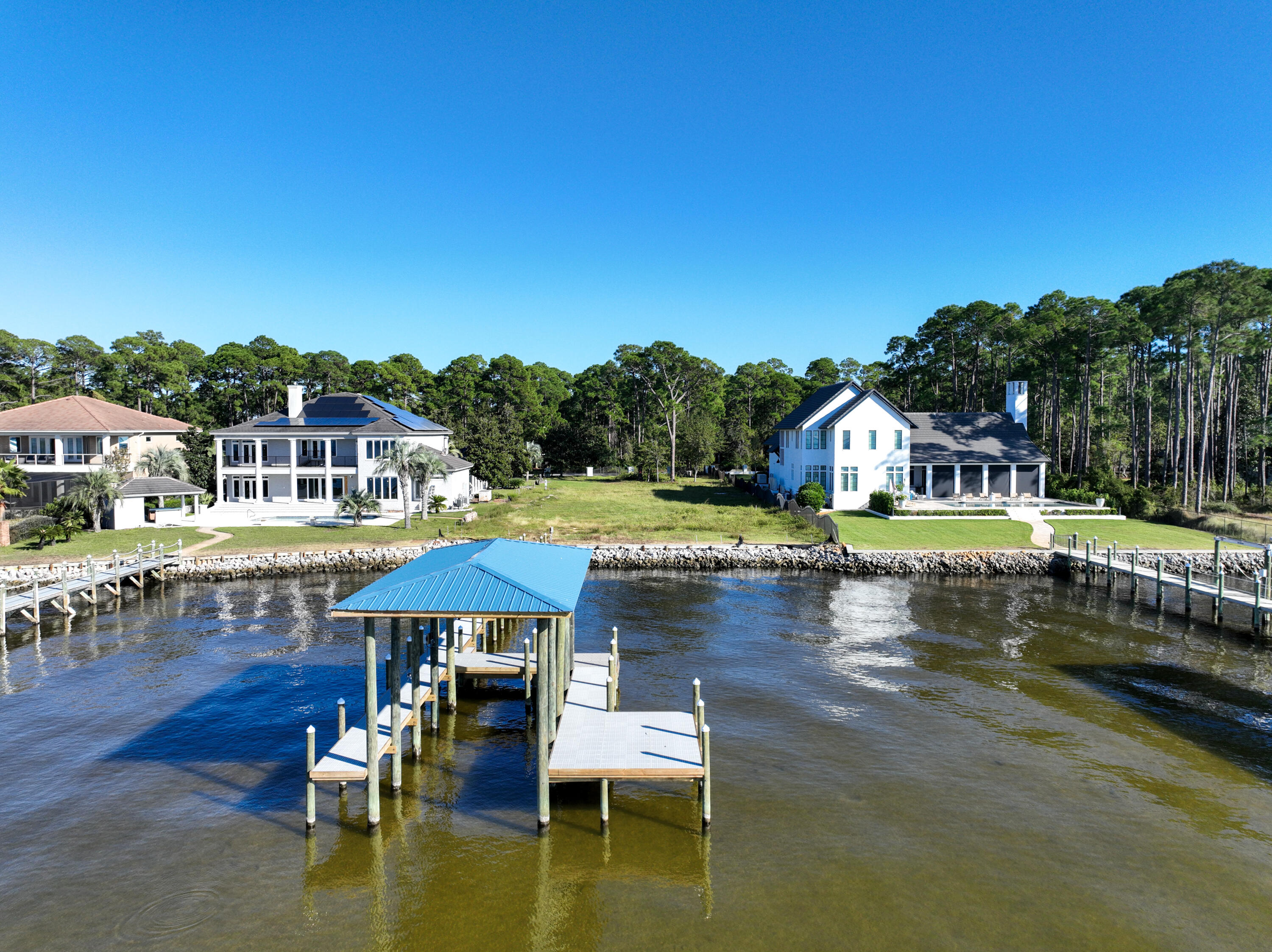 643 Driftwood Point Road Santa Rosa Beach, FL 32459 - Photo 3 of 17 a swimming pool with outdoor seating and yard
