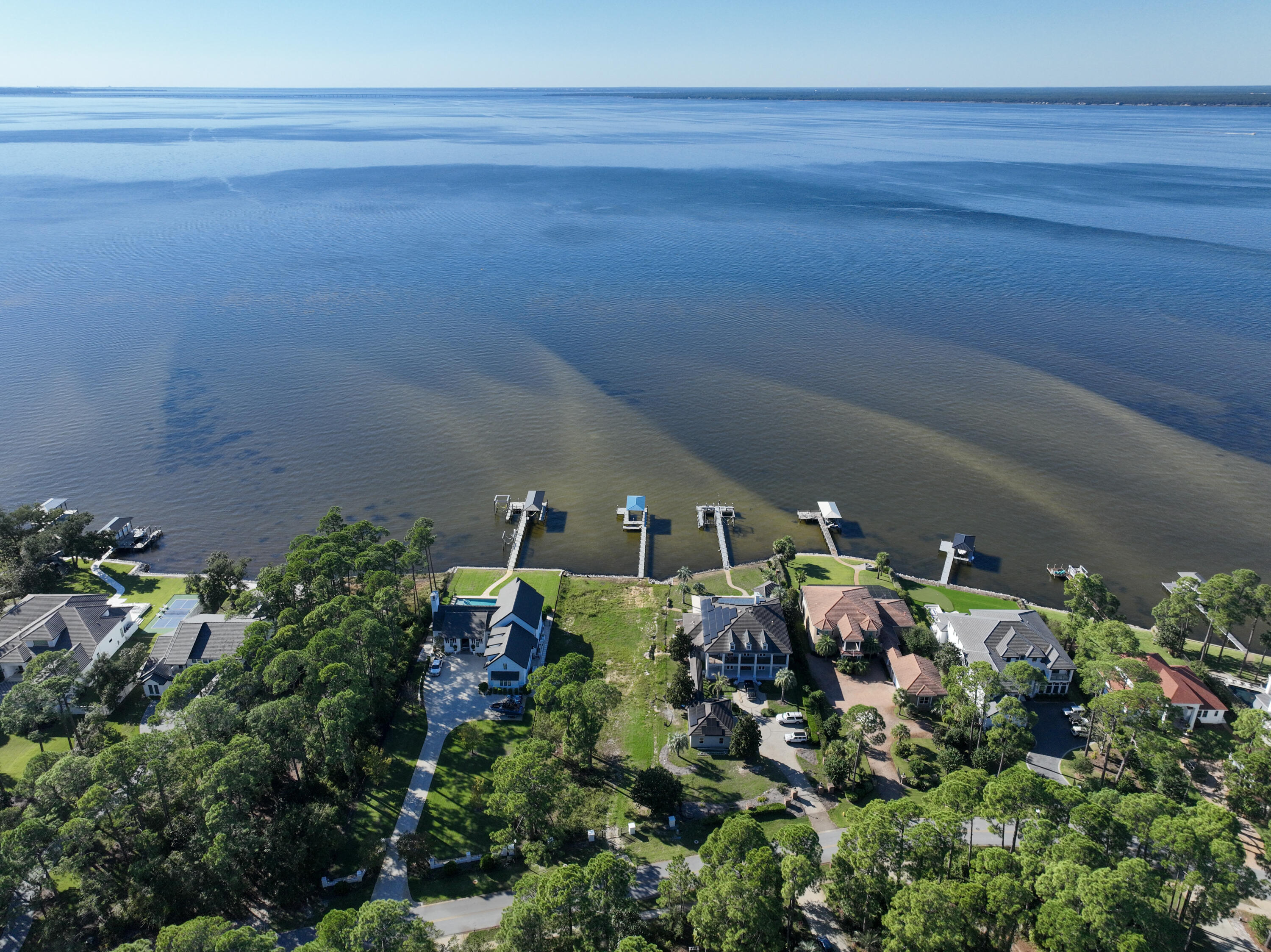 643 Driftwood Point Road Santa Rosa Beach, FL 32459 - Photo 9 of 17 a front view of a house with a yard