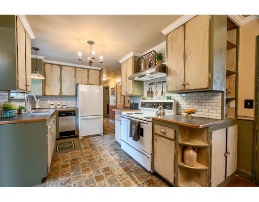 114 S Road Templeton, MA 01468 - Photo 12 of 42 a kitchen with a sink cabinets stainless steel appliances and a window