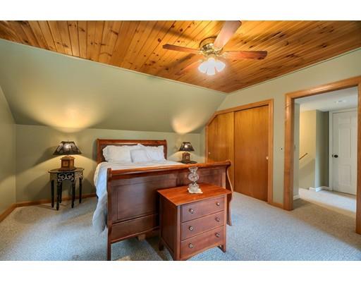 114 S Road Templeton, MA 01468 - Photo 23 of 42 a room with furniture and a wooden floor