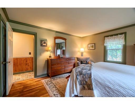 114 S Road Templeton, MA 01468 - Photo 25 of 42 a bedroom with a bed and wooden floor