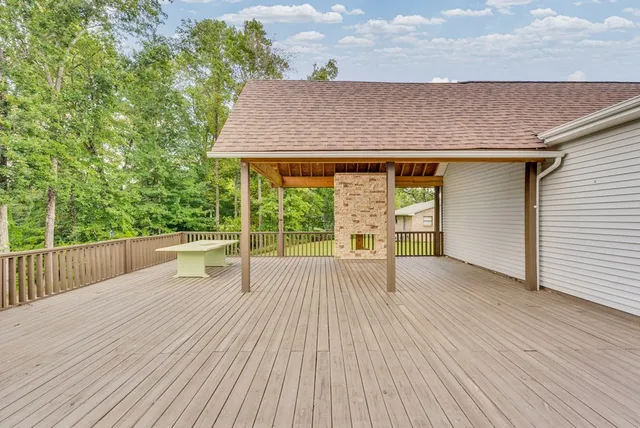 a view of swimming pool with seating space