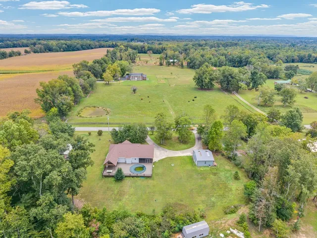 a view of a yard with an outdoor space