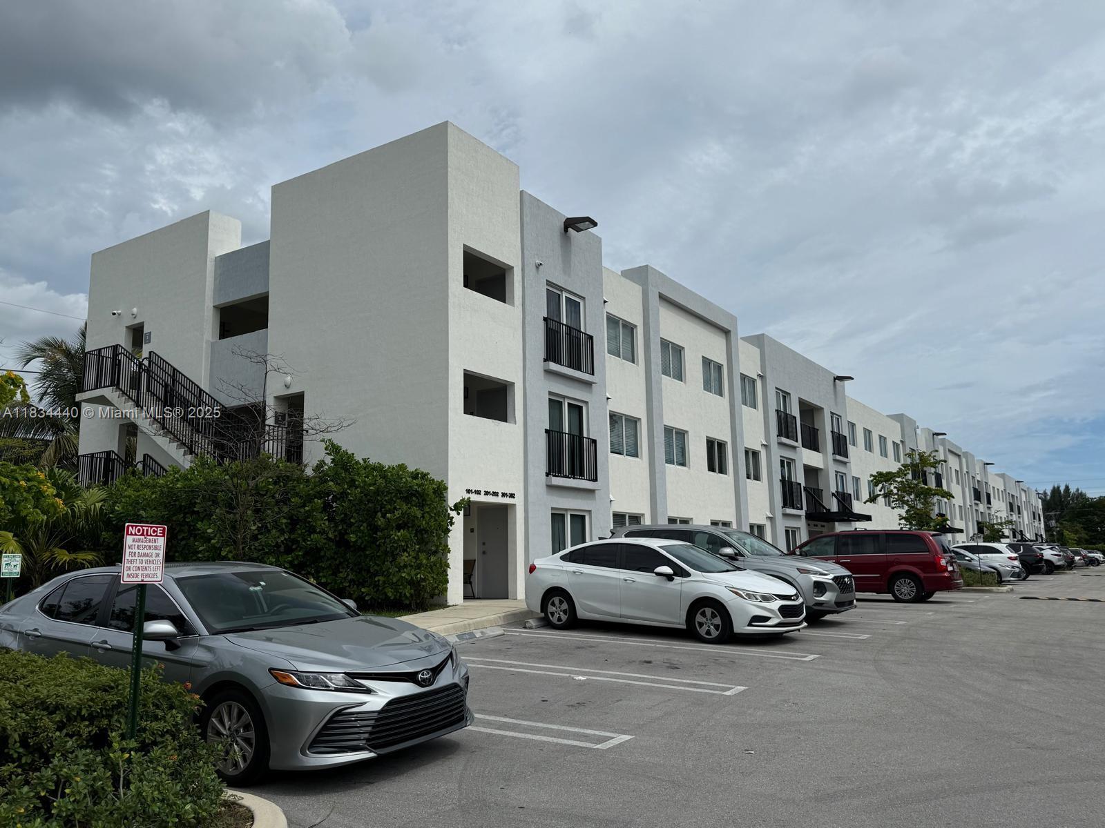 Golden Glades Miami, FL 33161 - Photo 1 of 11 a car parked in front of a building