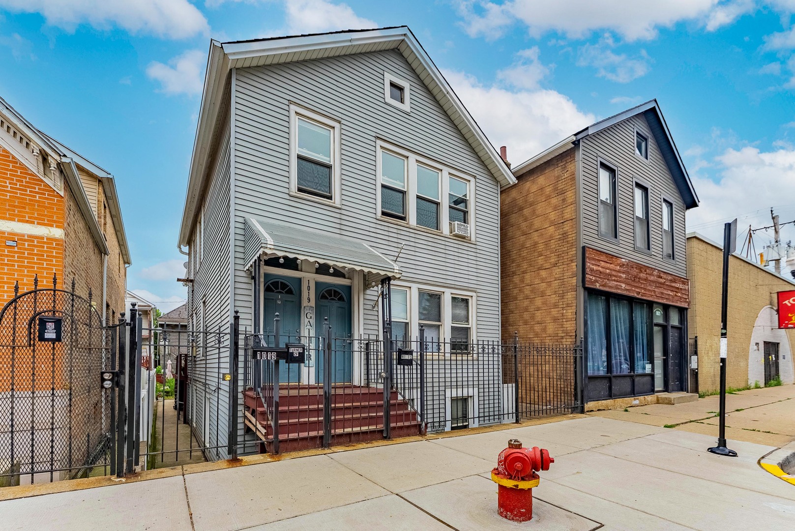 a front view of a house with a garage