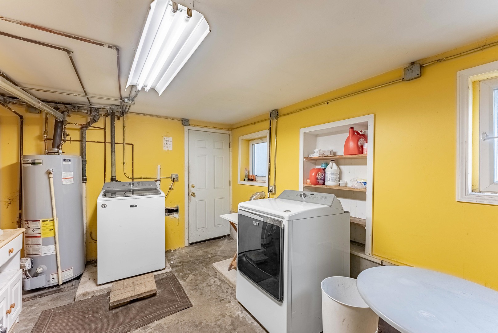 1019 West 18th Street Chicago, IL 60608 - Photo 21 of 26 a storage room with a washer and dryer