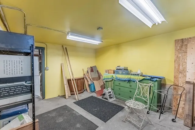 a view of a balcony with furniture
