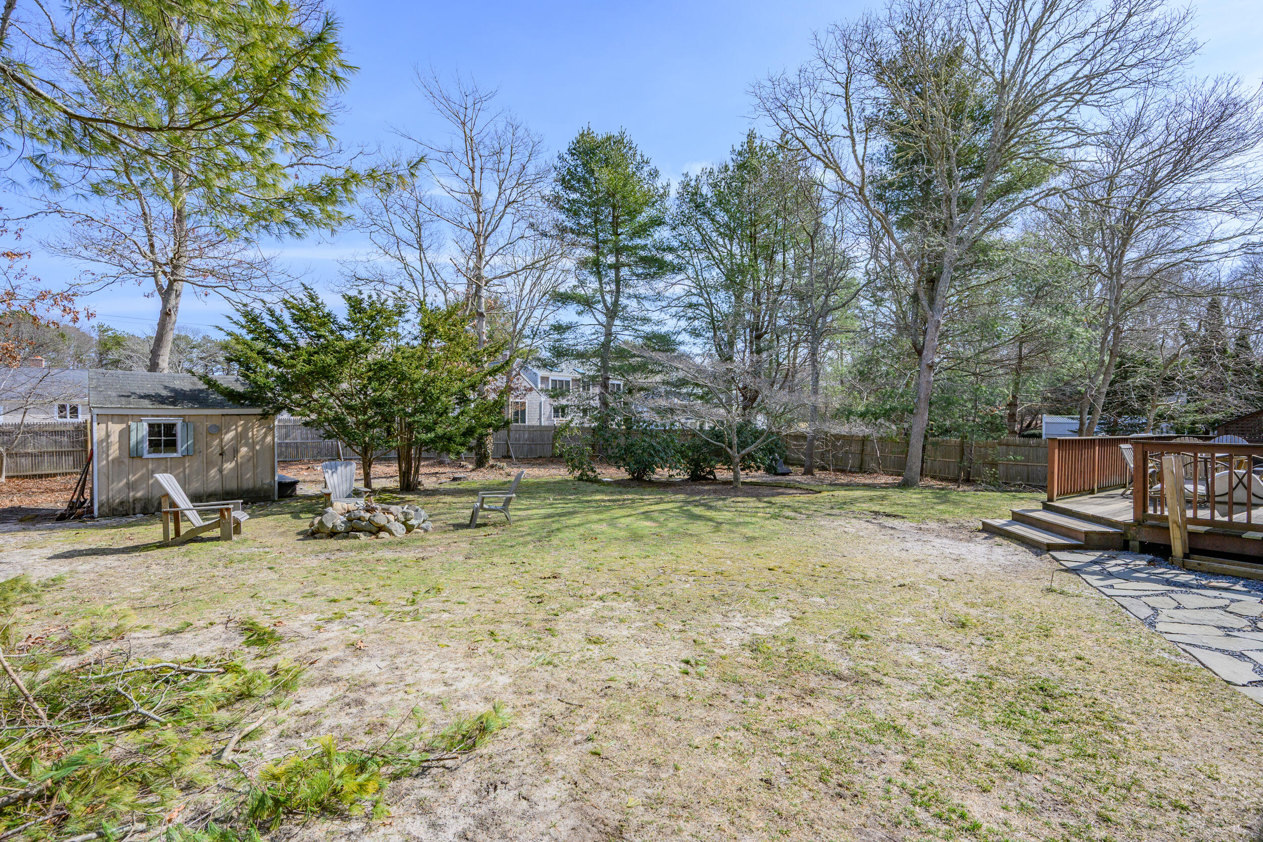 172 Skunknet Road Centerville, MA 02632 - Photo 28 of 37 Fenced in yard with shed