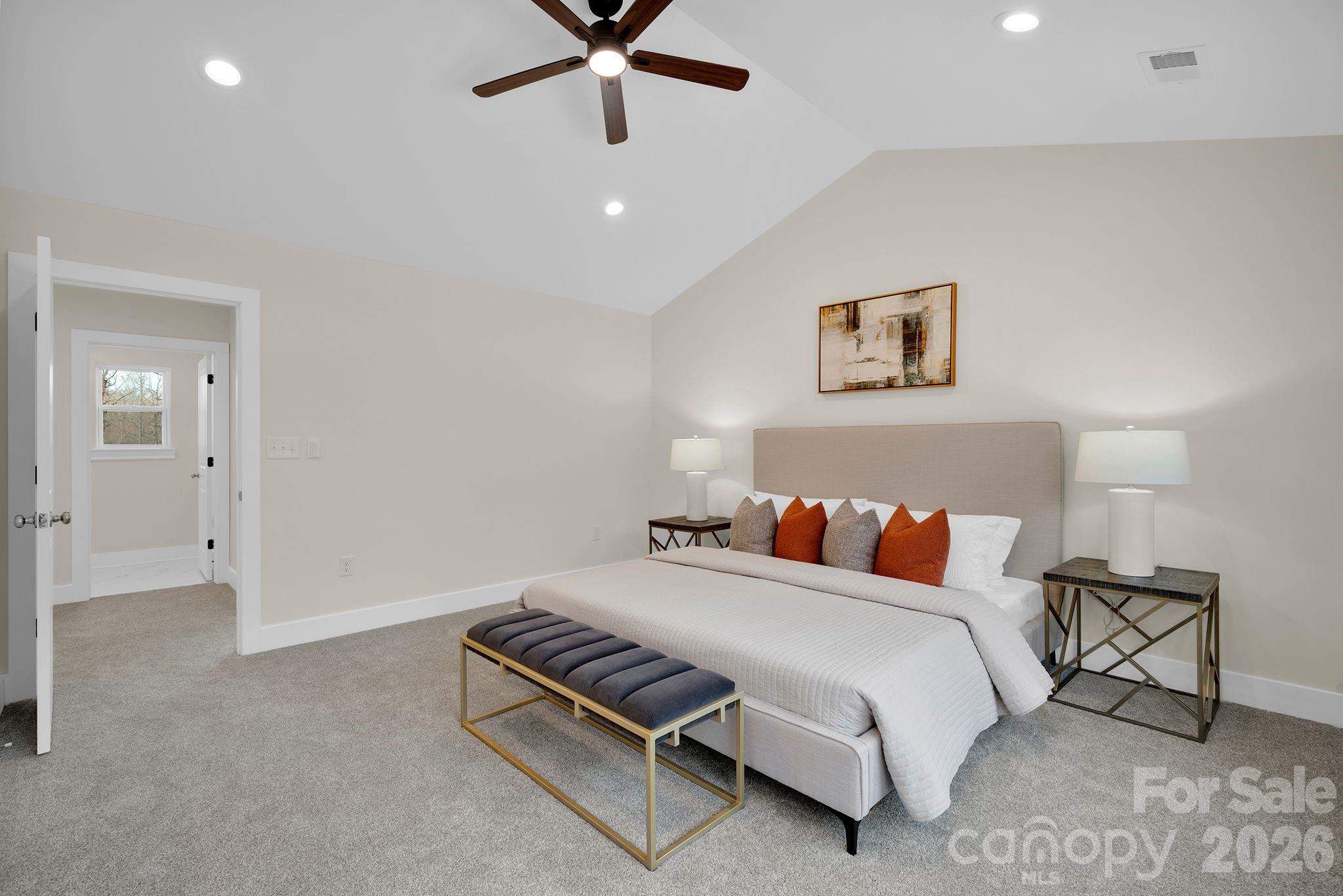 9052 Unity Church Road Mooresville, NC 28115 - Photo 15 of 32 a bedroom with a bed and a painting