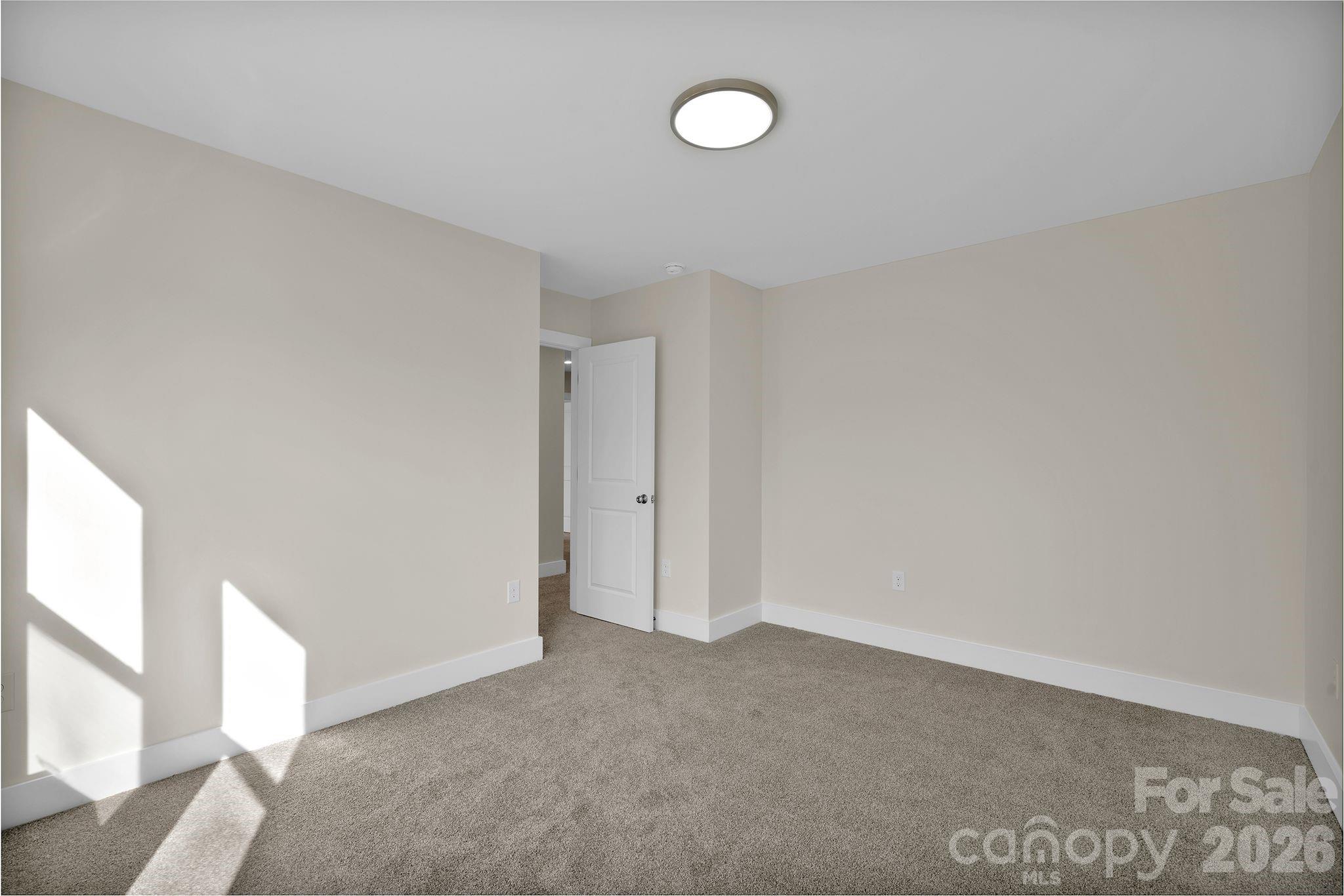 9052 Unity Church Road Mooresville, NC 28115 - Photo 30 of 32 a view of an empty room