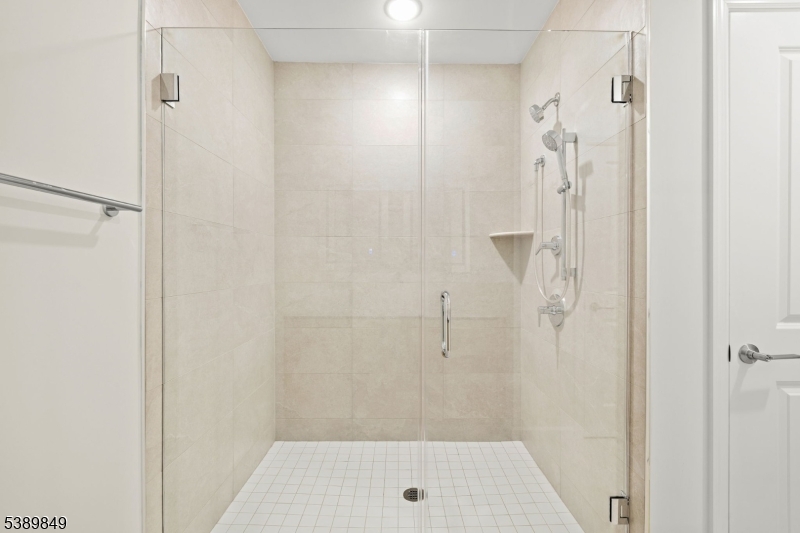 70 Ridgedale Avenue, Unit 207 Morristown, NJ 07960 - Photo 13 of 21 a bathroom with a shower