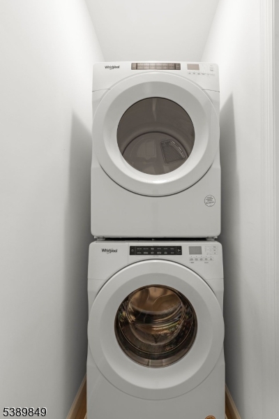 70 Ridgedale Avenue, Unit 207 Morristown, NJ 07960 - Photo 16 of 21 a utility room with dryer and washer